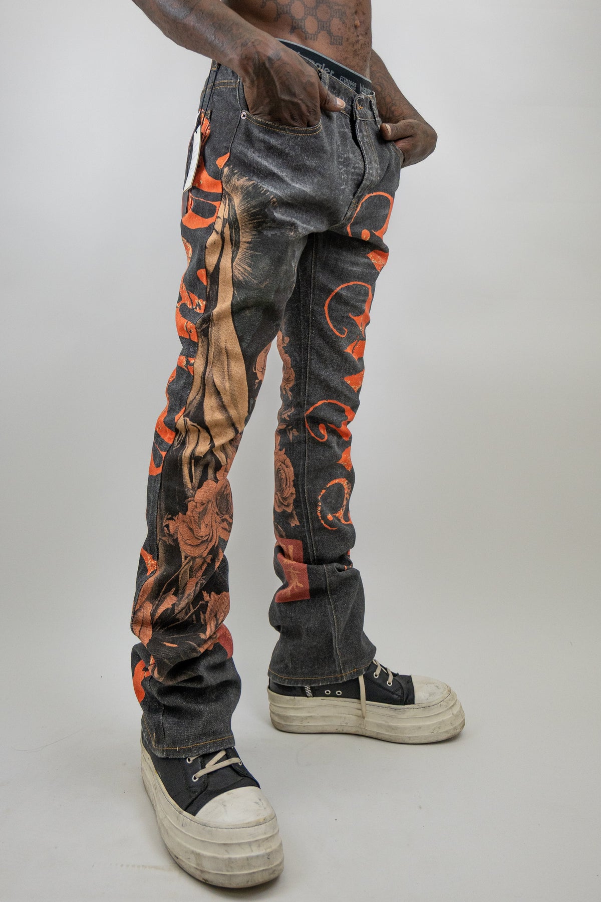 RM201SK - Graphic Printed Stacked Jeans